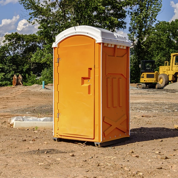 how often are the portable restrooms cleaned and serviced during a rental period in Alba